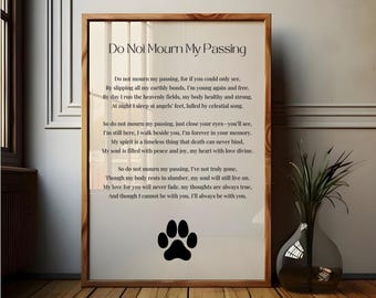 May include: A framed print with a black paw print at the bottom. The print features a poem titled "Do Not Mourn My Passing" about the loss of a pet.