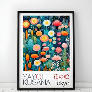 May include: A framed art print featuring a vibrant floral design with orange, pink, and white flowers against a dark teal background. The print includes the text "YAYOI KUSAMA Tokyo" in black and red.
