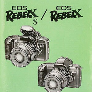 May include: Canon EOS Rebel XS and EOS Rebel X camera instruction manual with a green cover. The manual has the text "English Edition" and "INSTRUCTIONS E" on the bottom right corner.