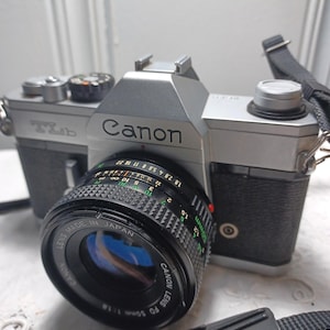 Canon TLb film Camera w/50mm f:1.8 Canon FD Lens  Clean Tested Film Camera Great 4 Student-Inc Batteries+Strap