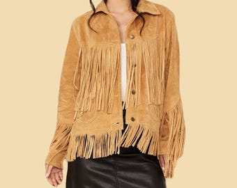 May include: A brown suede jacket with fringe detailing. The jacket has a button-up front and long sleeves.