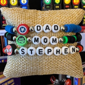 Personalized Superhero bracelet.  Choose name or word and superhero.