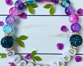 Disneyland 70th anniversary beaded stretch bracelet with gold Disneyland letter beads