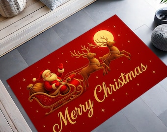 May include: A rectangular red Christmas rug featuring Santa Claus in his sleigh pulled by reindeer under a full moon. The words "Merry Christmas" are written in gold script across the bottom.