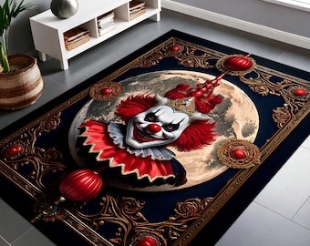 May include: A dark blue rug with a gold ornate frame and a creepy clown face in the center. The clown is wearing a red and white costume and has a red nose. The rug has a moon and stars design.