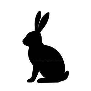 Puede incluir: Silueta negra de un conejo sentado, mirando hacia la izquierda. El conejo tiene orejas largas y un cuerpo redondeado. El texto "Amazing Digital Market" está en la parte inferior.