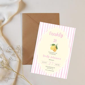 May include: A white ceramic mug with a black handle and the text "But First, Coffee" in a bold, black font. The mug is set against a blurred background, suggesting a cozy setting.