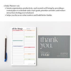 May include: A white notepad with the text "all the things" and a to-do list, a pen, and a gray "thank you" card. The notepad has sections for tasks, appointments, errands, and meals. The pen is black with a blue accent.