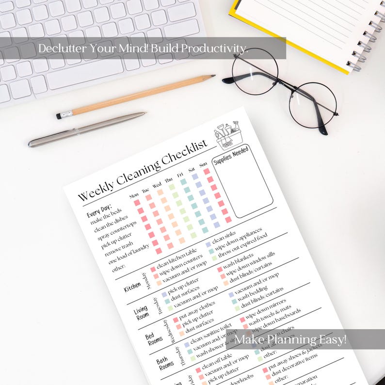 May include: A white printed weekly cleaning checklist with colorful checkboxes, a pencil, a pen, and round glasses. The text "Declutter Your Mind! Build Productivity" and "Make Planning Easy!" are visible. The checklist includes tasks for each room.