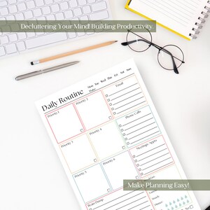 May include: A daily routine planner sheet with sections for priorities, email, phone calls, and meetings. The page features pastel-colored borders and checkboxes. Text includes "Daily Routine," "Decluttering Your Mind! Building Productivity," and "Make Planning Easy!" along with days of the week.