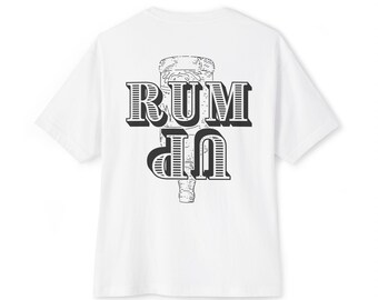 May include: White t-shirt with a black graphic design on the back. The design features the words "RUM UP" in a bold, stylized font, with an illustration of a bottle. The shirt has short sleeves and a crew neck.