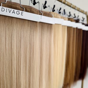 Naadloze clip-in hairextensions | 100% premium mensenhaar | Verkocht in sets van 18 en 22 inch