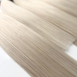 Blonda äkta hårförlängningar: Virgin Remy Tape-In, K-Tip, Nano Tips - 50g bild 3