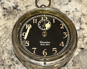 Antiguo reloj despertador de cuerda Westclox Art Déco con esfera negra