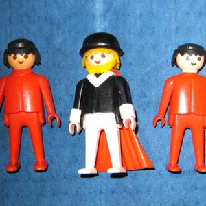 Lot von 5 Playmobil Geobra 1974 rote Menschen und 1 Bart cape dude