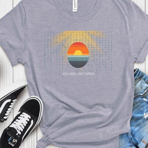 Unisex Cotton T-Shirt | Soft Comfort Fit Shirt | Minimal Style Tee | Casual Everyday Top| Solar Divide – Futuristic Sun & Code-Inspired Tee