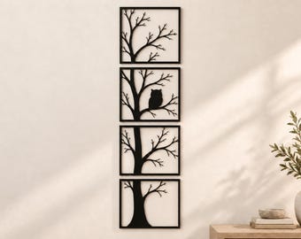 May include: A set of four square black metal wall art panels arranged vertically. Each panel features a cutout silhouette of a tree, with one panel including the silhouette of an owl perched on a branch among the tree limbs.