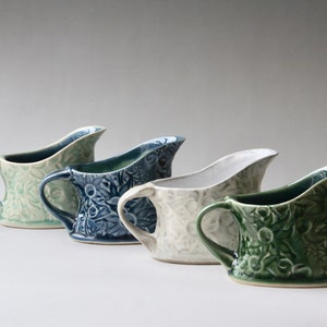 Milk jug or creamer with flannel flowers