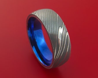 Damascus Steel Ring with Anodized Titanium Interior Sleeve Custom Made