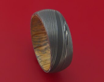 Damascus Steel Ring with Whiskey Barrel Interior Wood Sleeve Custom Made