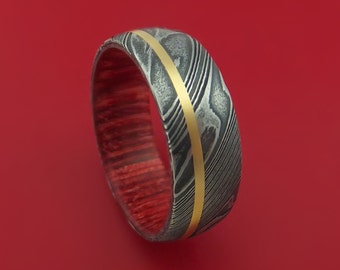 Kuro Damascus Steel Ring with 14K Yellow Gold Inlay and Red Heart Wood Hardwood Sleeve Custom Made Wood Band