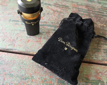 Dom Perignon Champagne Bottle Stopper with velvet bag
