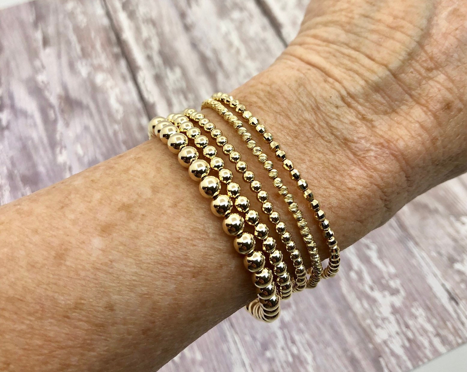 Solid 14 Karat Gold Round Beaded Bracelet 4 Mm vintage-14k-domed-herringbone-bracelet-14k-aurafin-ute-soft-bangles