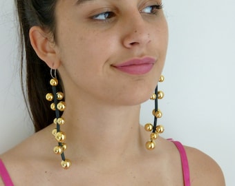 long Asymmetrical cascade earrings,  linear oversized jewellry