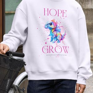 Kleurrijke babydino – HOPE & GROW | Motiverend digitaal kledingontwerp