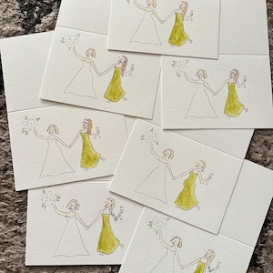 Puede incluir: Una colecci&oacute;n de tarjetas de felicitaci&oacute;n rectangulares blancas con una ilustraci&oacute;n dibujada a mano de dos figuras tomadas de la mano. Una figura viste un vestido blanco y sostiene un ramo, mientras la otra viste un vestido verde y una copa.