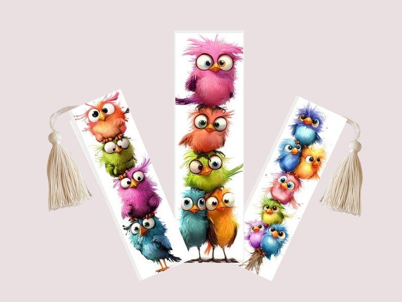 May include: Three whimsical bookmarks featuring stacks of cartoon birds in vibrant colors. Each bookmark has a white tassel. The birds are in shades of pink, orange, green, blue, and yellow, with large, expressive eyes.