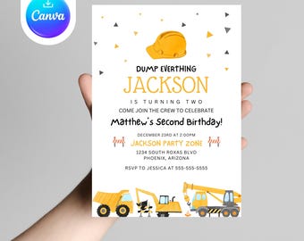 May include: A white invitation card with a construction theme. The text reads "Dump Everthing Jackson is turning two". Includes illustrations of construction vehicles and a yellow hard hat. RSVP details are provided.