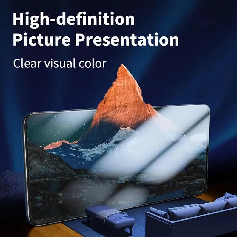 May include: A high-definition picture presentation with the text "High-definition Picture Presentation" and "Clear visual color" displayed on a black smartphone screen. The screen shows a mountain range with a cloudy sky.