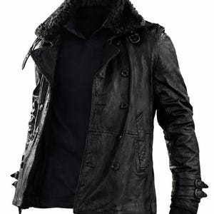 May include: Black leather jacket with a faux fur collar. The jacket features a double-breasted design, multiple buttons, and buckle details on the sleeves. The jacket is open, revealing a black shirt underneath.
