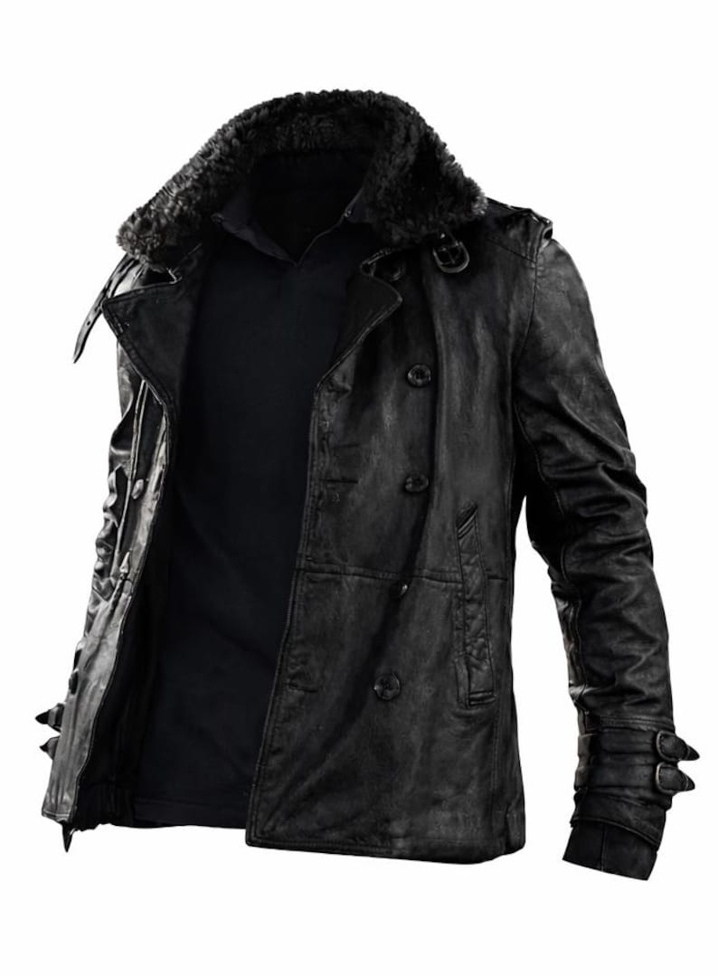 May include: Black leather jacket with a faux fur collar. The jacket features a double-breasted design, multiple buttons, and buckle details on the sleeves. The jacket is open, revealing a black shirt underneath.