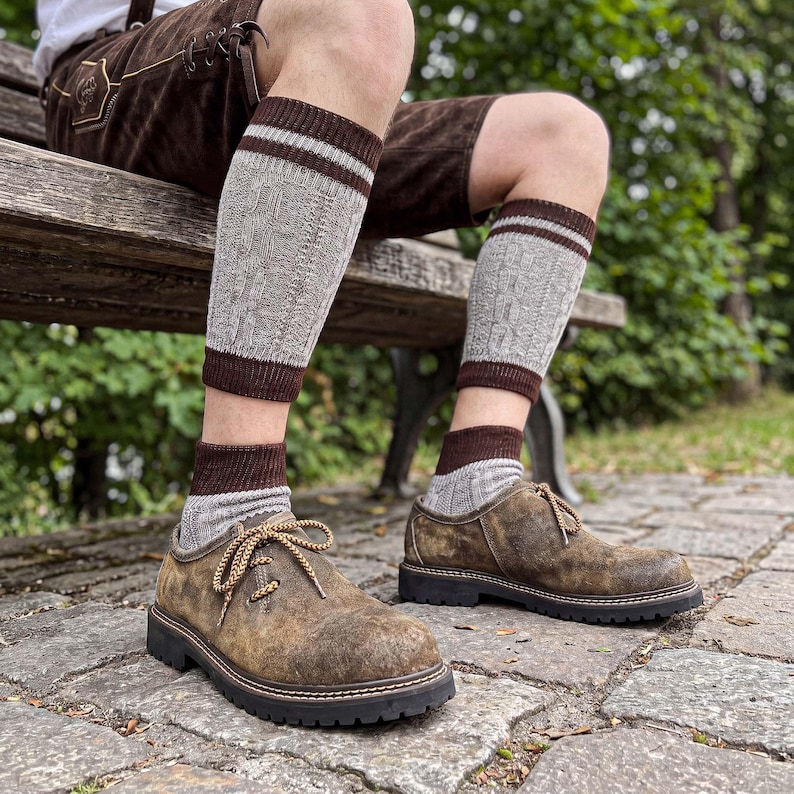 Antiqued brown Bavarian shoes worn with traditional Oktoberfest lederhosen and socks.
