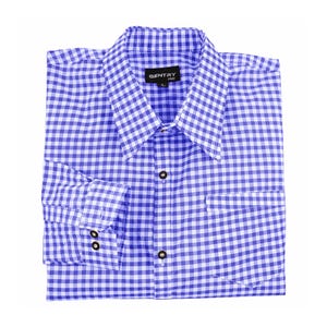 Flat lay of men's blue checkered German shirt with folded sleeves traditional Oktoberfest attire