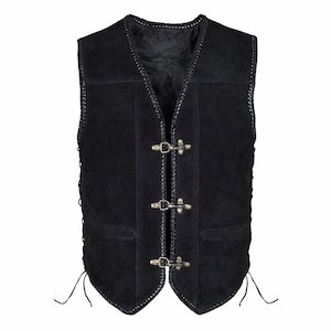 Front-facing product image of a black cowhide suede leather vest displayed on a white background. The biker vest features three antique brass hook closures, braided edging along the front and armholes, and two traditional waistcoat-style front pockets. The symmetrical layout clearly highlights the structured cut and classic sleeveless biker design.