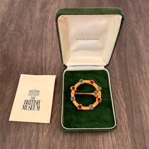 British Museum Lover’s Brooch: Gold Bronze, Ruby Sapphire Style Stones Vintage