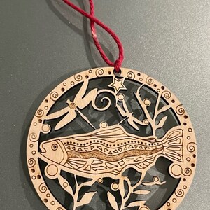 Salmon, dragonfly laser engraved wood ornament, designed and laser cut by me. Original design, inspired by nature.