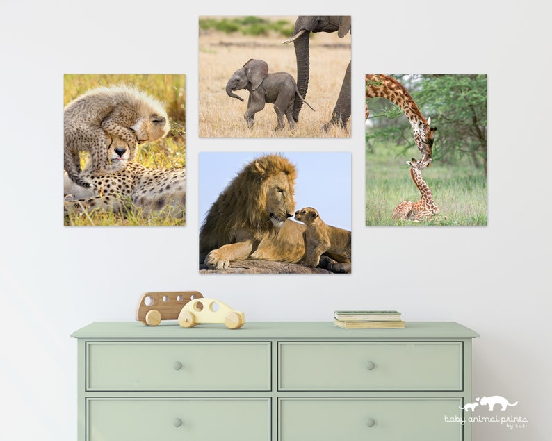 May include: A set of four animal prints featuring a lion and lion cub, a cheetah and cheetah cub, a giraffe and giraffe cub, and an elephant and elephant calf. The prints are all in a natural setting and feature the animals in a loving embrace.