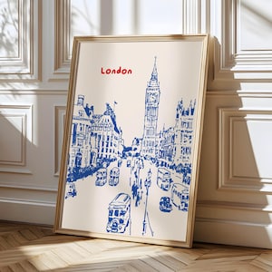May include: A framed illustration of London, England, with Big Ben in the background and blue double-decker buses in the foreground. The text "London" is written in red at the top of the image.