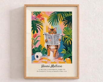 May include: A framed art print featuring a tabby cat sitting on a white toilet reading a newspaper, surrounded by vibrant green tropical plants and pink flowers. The text reads Henri Matisse, 70, RUE DE L'UNIVERSITE, PARIS, VII, Du Vendredi 27 Fevrier au Samedi 28 Mars 1953.