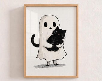 May include: A framed art print featuring a black and white illustration of a ghost wearing a white sheet with two eye holes, holding a fluffy black cat in its arms. The ghost has a simple, rounded shape and the cat has a small pink nose.