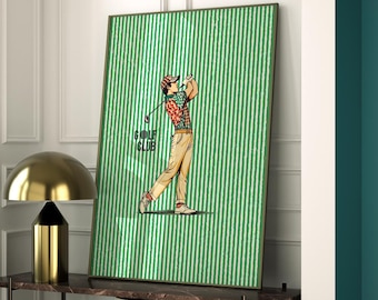 May include: A framed print featuring a vintage illustration of a golfer in action. The artwork has a green and white striped background with the words "GOLF CLUB". The golfer is wearing a plaid shirt, cap, and khaki pants.
