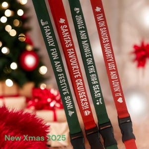May include: Four fabric lanyards in red and green with black plastic buckles. The lanyards feature white text: FAMILY FUN AND FESTIVE SUN!, SANTA'S FAVOURITE CRUISERS!, JINGLE AND MINGLE ON THE HIGH SEAS!, and I'M ON SANTA'S NAUGHTY LIST AND LOVIN' IT.