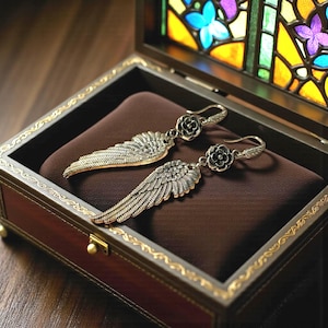 Gift Idea Collection Silver Angel Wing Earring Bohemian Dangle Design Floral Charm Accent Lightweight Statement Piece Wedding Guest Accessory Party Wear Essential Celestial Jewelry Trend Boho Style Fashion Special Occasion Must Have