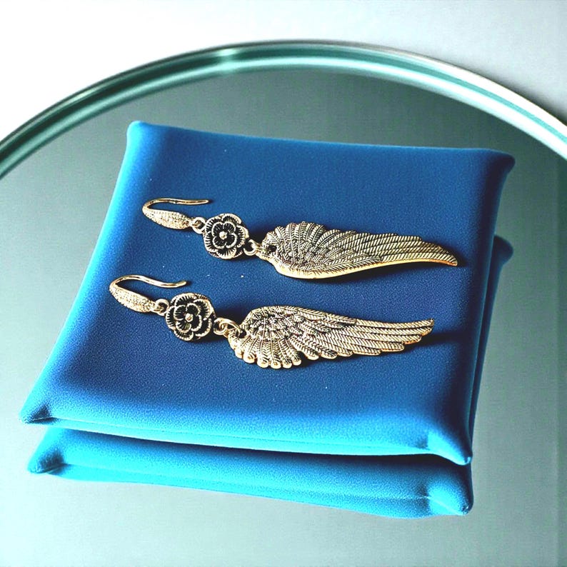 Gift Idea Collection Silver Angel Wing Earring Bohemian Dangle Design Floral Charm Accent Lightweight Statement Piece Wedding Guest Accessory Party Wear Essential Celestial Jewelry Trend Boho Style Fashion Special Occasion Must Have