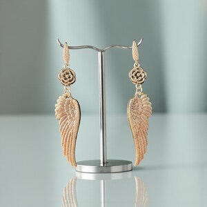Gift Idea Collection Silver Angel Wing Earring Bohemian Dangle Design Floral Charm Accent Lightweight Statement Piece Wedding Guest Accessory Party Wear Essential Celestial Jewelry Trend Boho Style Fashion Special Occasion Must Have