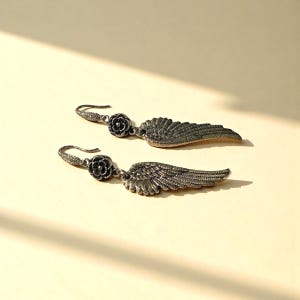 Silver Angel Wing Earring Bohemian Dangle Design Floral Charm Detail Celestial Jewelry Collection Lightweight Statement Drop Style Wedding Guest Accessory Party Wear Essential Boho Fashion Trend Special Occasion Jewelry Unique Gift Idea